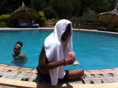 at the Kuriftu Resort in Bahir Dar! Denzel is enjoying strawberry ice cream by the pool.